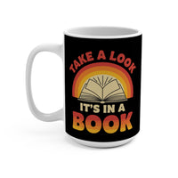 Load image into Gallery viewer, "Take A Look. It’s In A Book." 15oz Ceramic Mug — Retro Open-Book Design | Gift for Readers &amp; Teachers | Printed On Demand