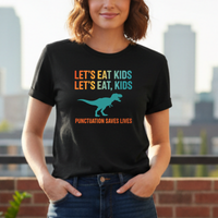 Load image into Gallery viewer, "Let's Eat Kids / Let's Eat, Kids" Gildan 64000 Women’s T‑Shirt 1 — Punctuation Saves Lives Funny Dinosaur Teacher Tee | Printed On Demand